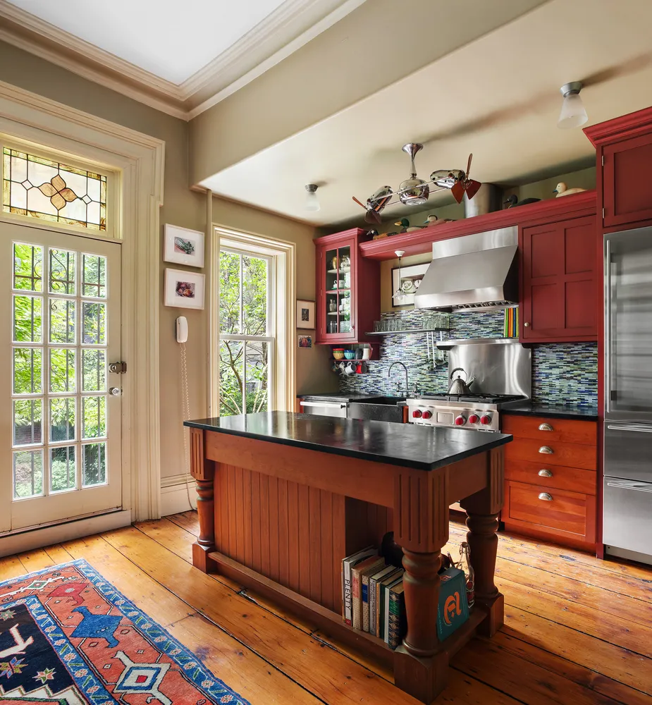 a view of kitchen island with furniture and wooden floor
