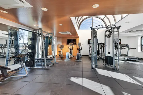 a view of a room with gym equipment