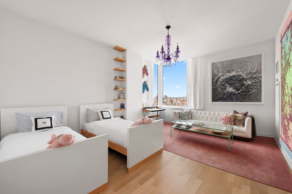 111 Central Park North, Unit PHB Manhattan, NY 10026 - Photo 16 of 17 a living room with furniture and a chandelier