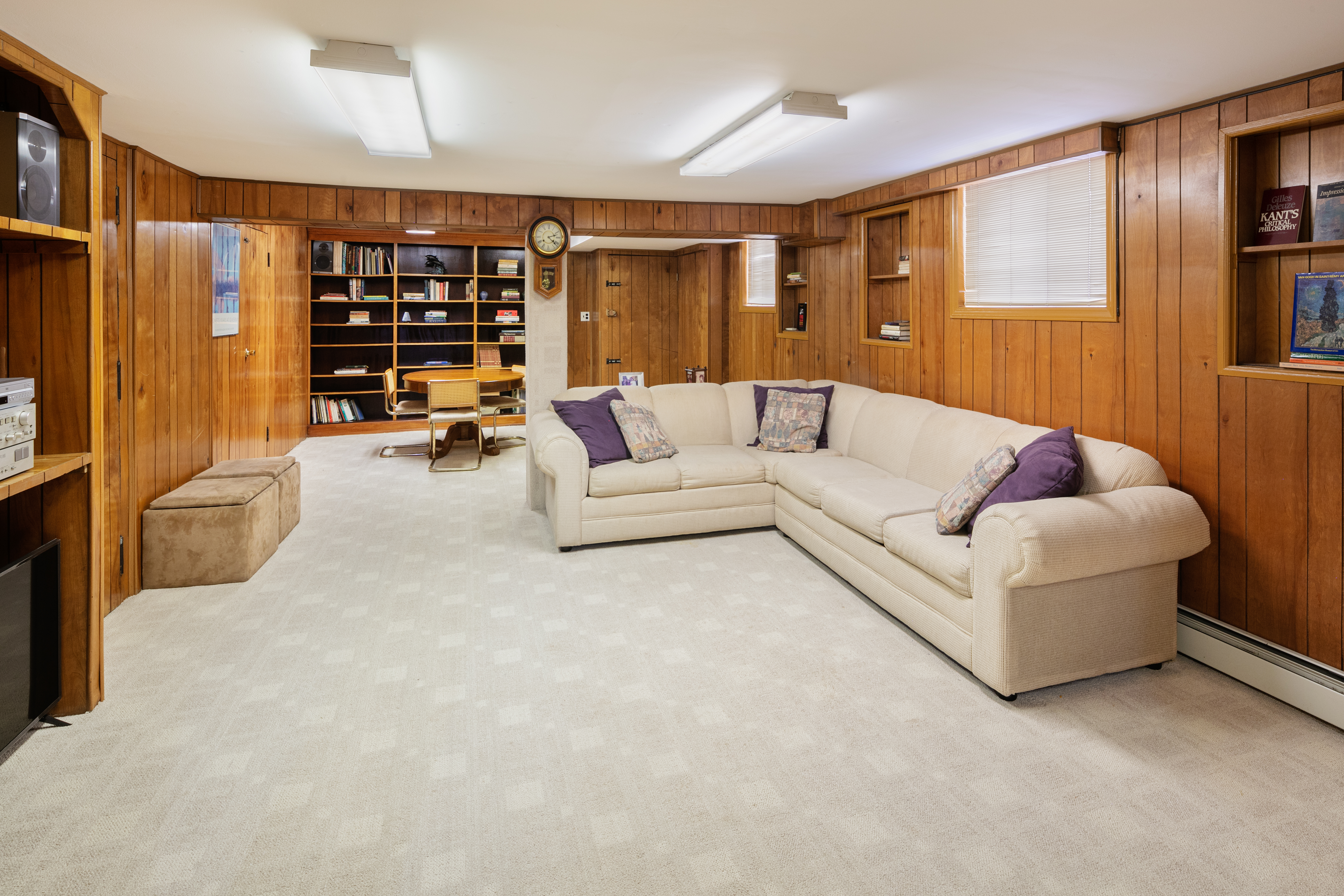 91 81st Street Brooklyn, NY 11209 - Photo 16 of 19 a living room with furniture and a flat screen tv