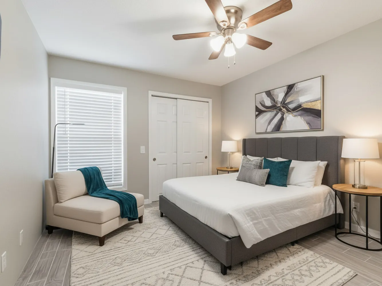 a bedroom with bed and a couch