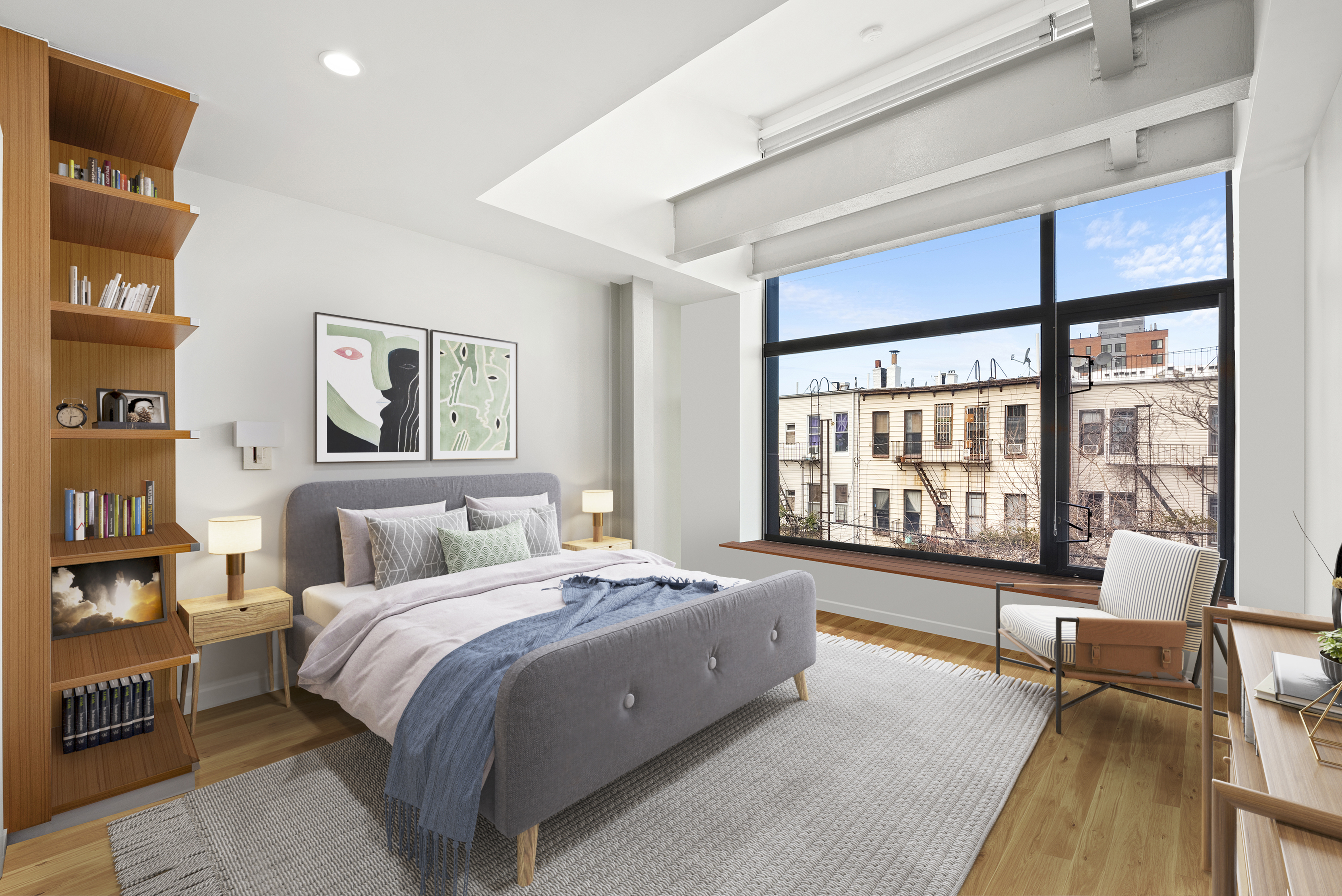 785 Hart Street, Unit THB Brooklyn, NY 11237 - Photo 7 of 15 a spacious bedroom with a large bed and a large window