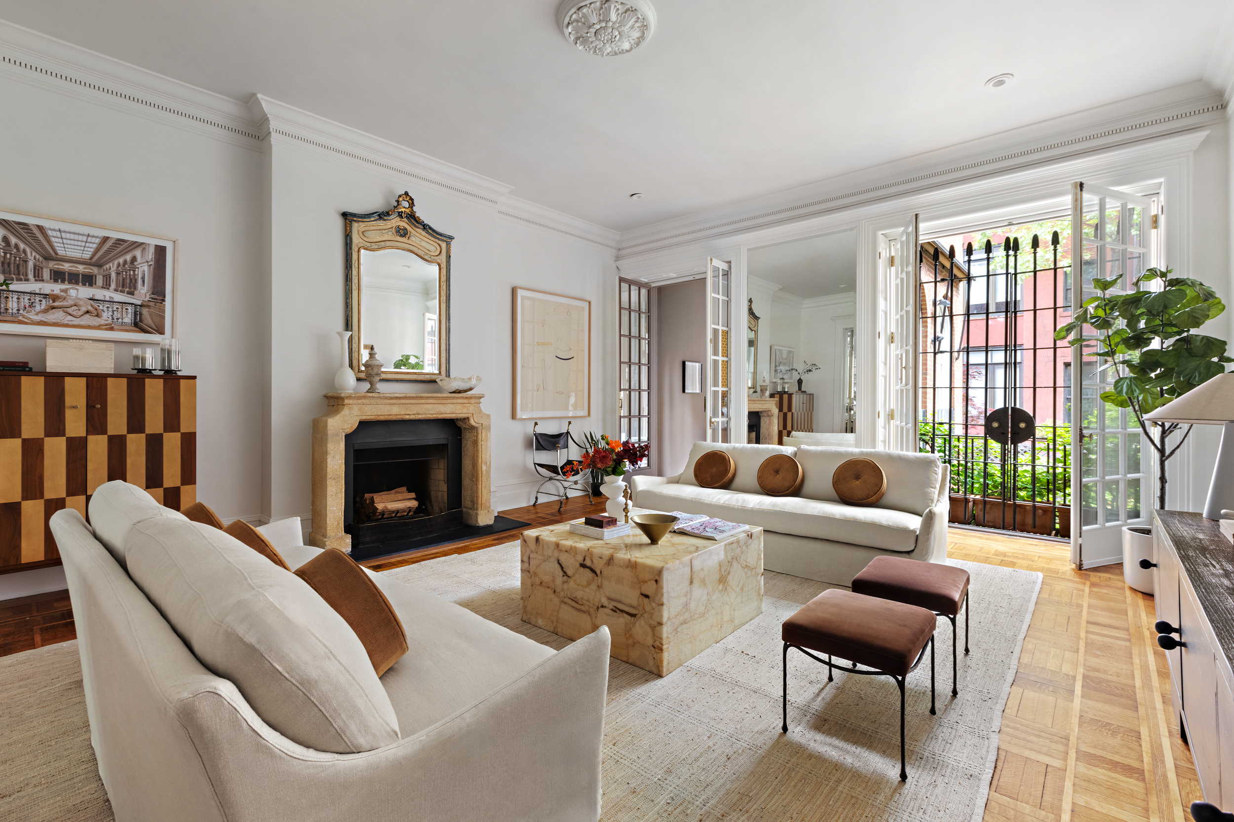 37 West 70th Street Manhattan, NY 10023 - Photo 11 of 41 a living room with furniture a fireplace and a potted plant