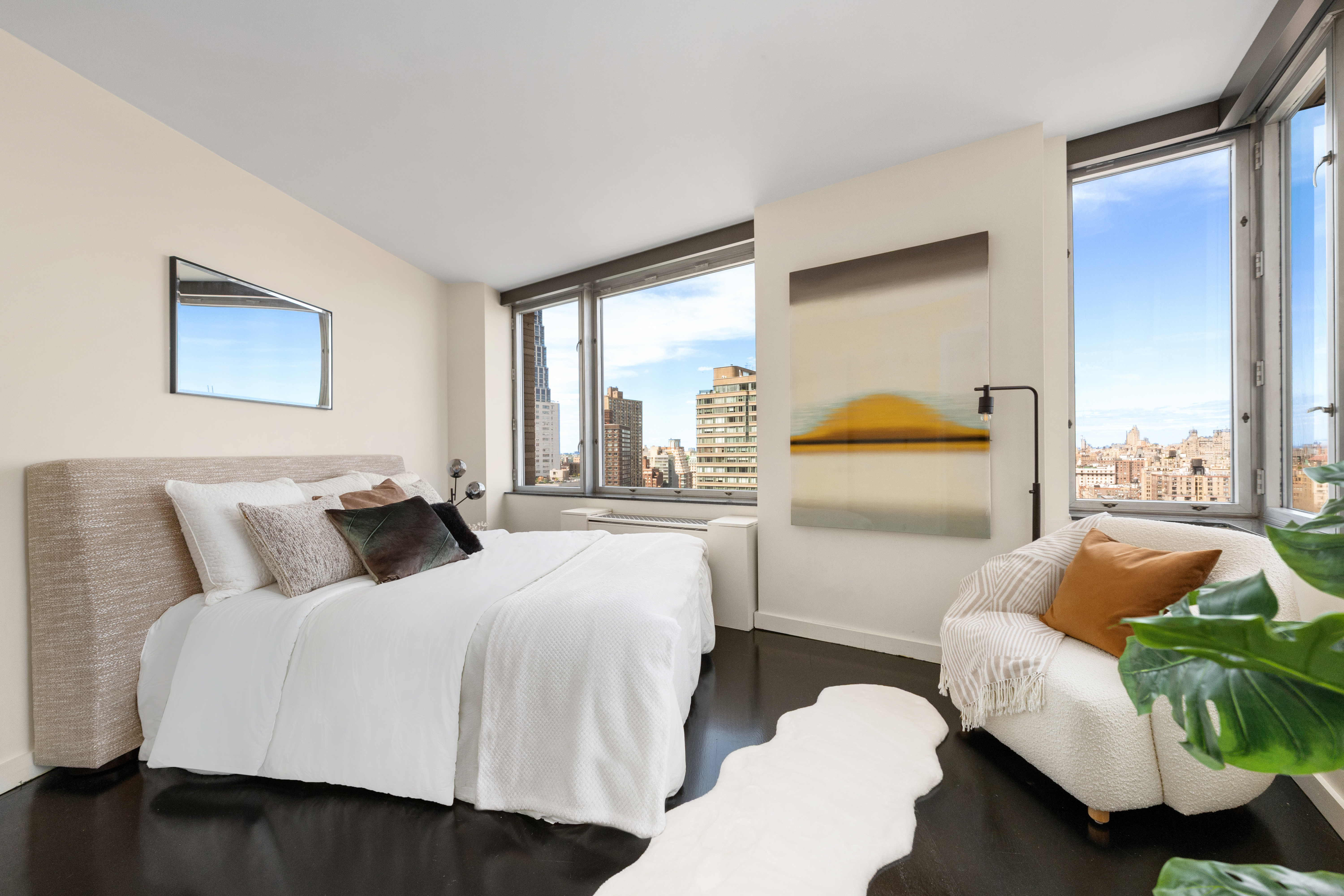 150 Columbus Avenue, Unit 22A Manhattan, NY 10023 - Photo 9 of 23 a bedroom with two beds and a large window