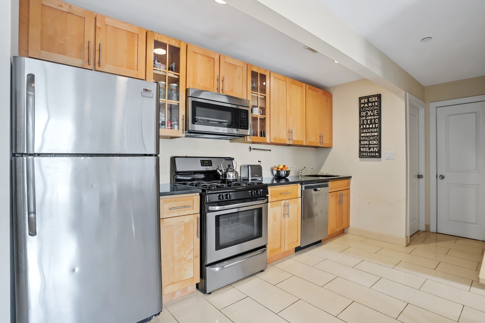 201 Huron Street, Unit 4F Brooklyn, NY 11222 - Photo 4 of 12 a white refrigerator freezer and a stove top oven