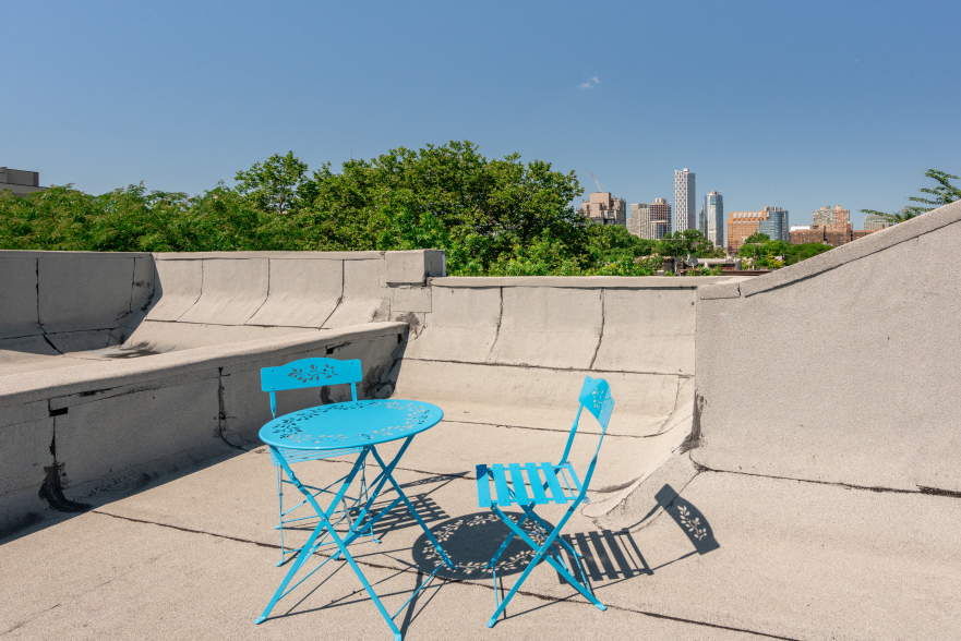 95 Vanderbilt Avenue, Unit AA Brooklyn, NY 11205 - Photo 9 of 11 a view of a chairs and table in patio