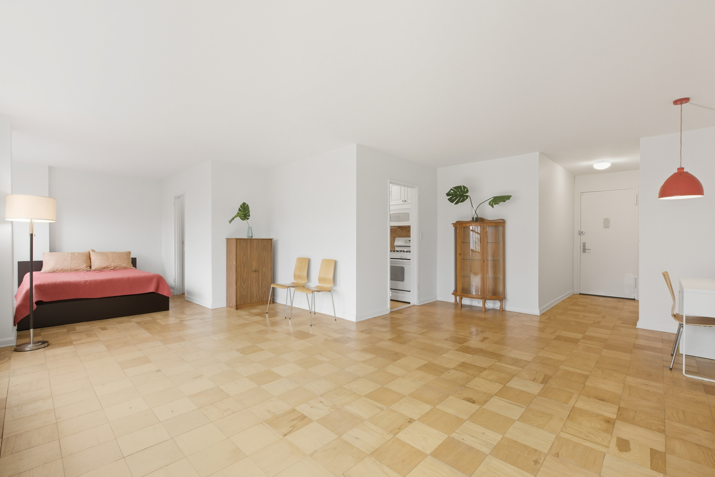 140 West End Avenue, Unit 6D Manhattan, NY 10023 - Photo 3 of 19 a large bedroom with a bed and dresser