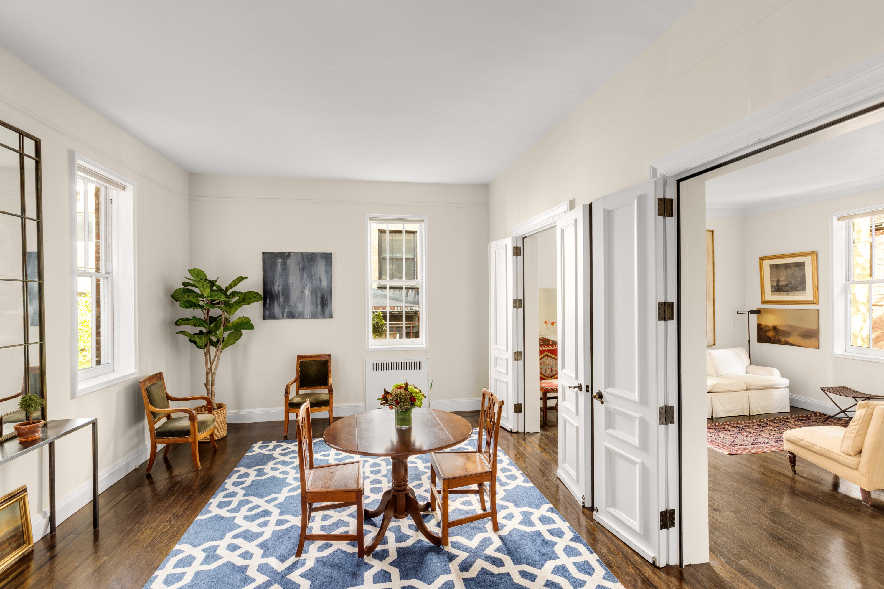 51 East 78th Street, Unit 3BC Manhattan, NY 10075 - Photo 7 of 25 a view of a livingroom with furniture and a window