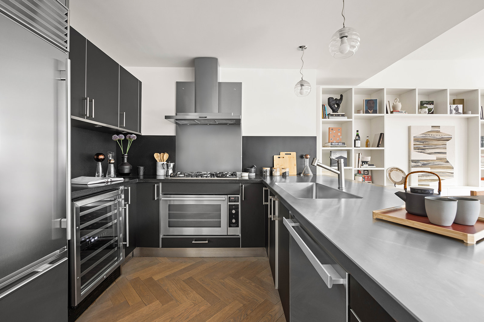 330 Spring Street, Unit 7D Manhattan, NY 10013 - Photo 5 of 11 a kitchen with cabinets and appliances