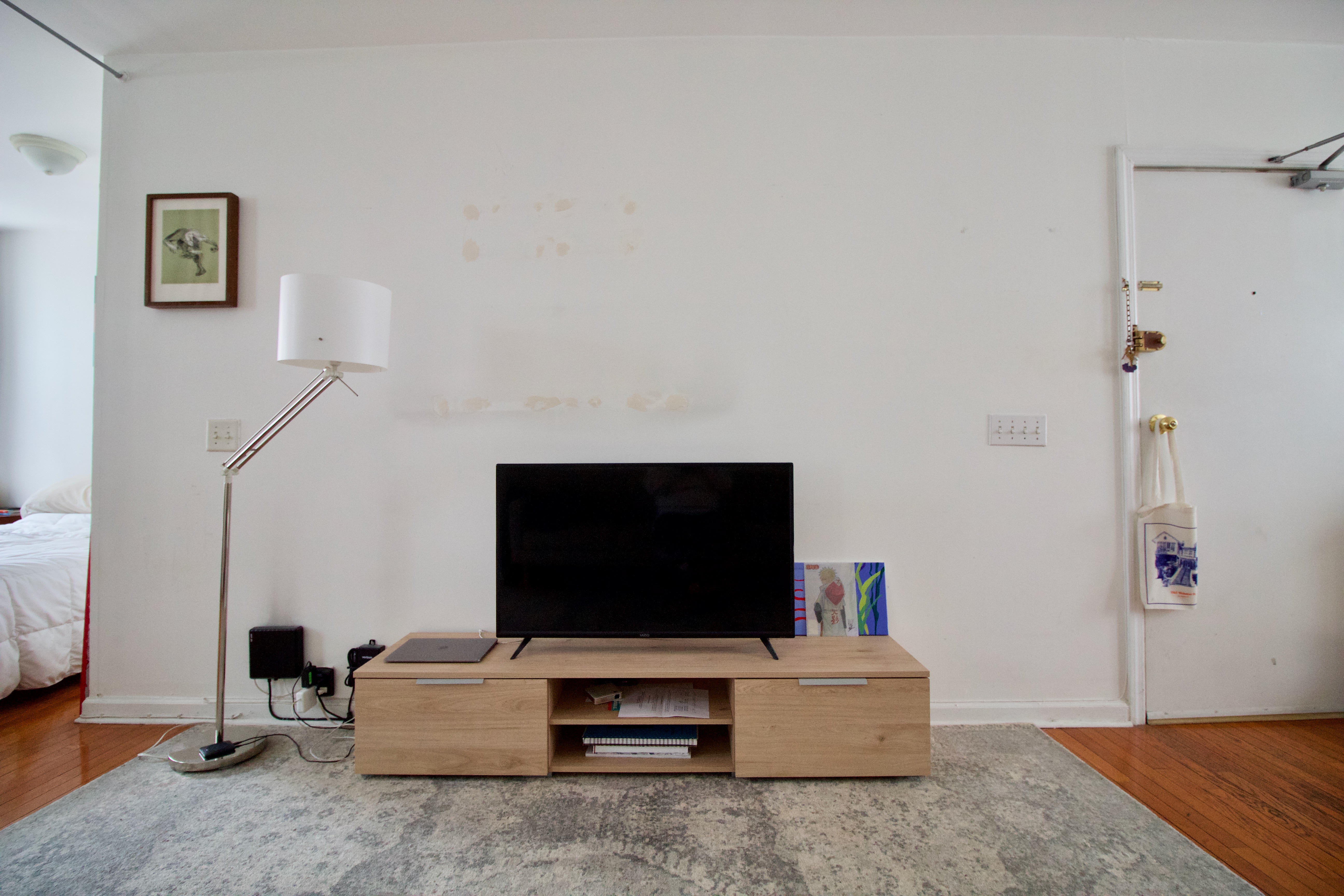 55 Duffield Street, Unit 3 Brooklyn, NY 11201 - Photo 3 of 14 a living room with furniture and a flat screen tv