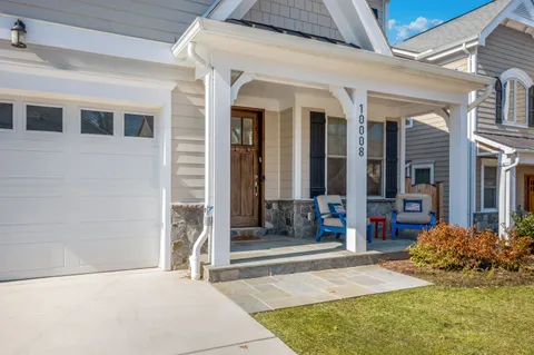 a view of dining room and hall with wooden floor