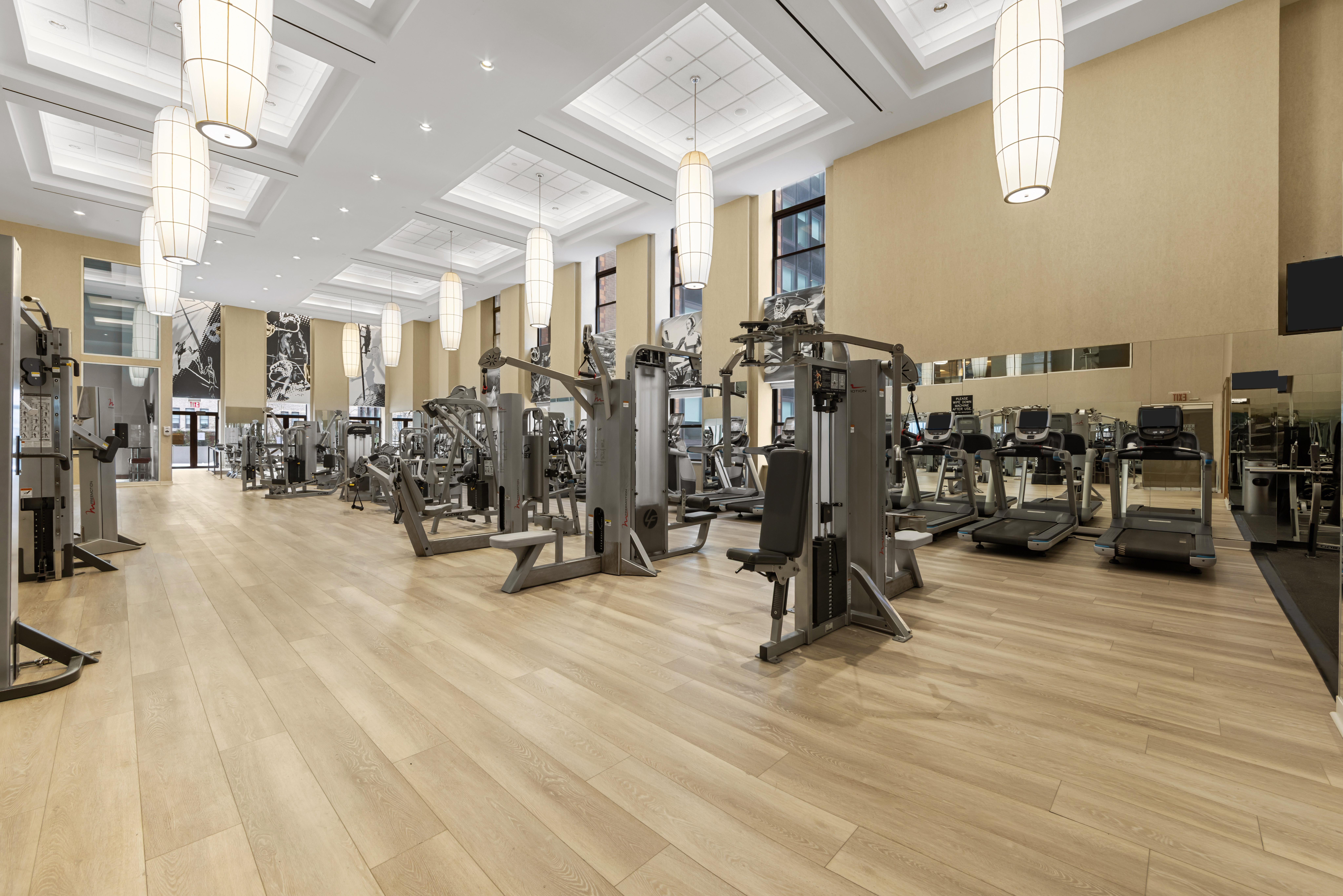 20 West Street, Unit 41D Manhattan, NY 10004 - Photo 7 of 17 a view of a room with gym equipment
