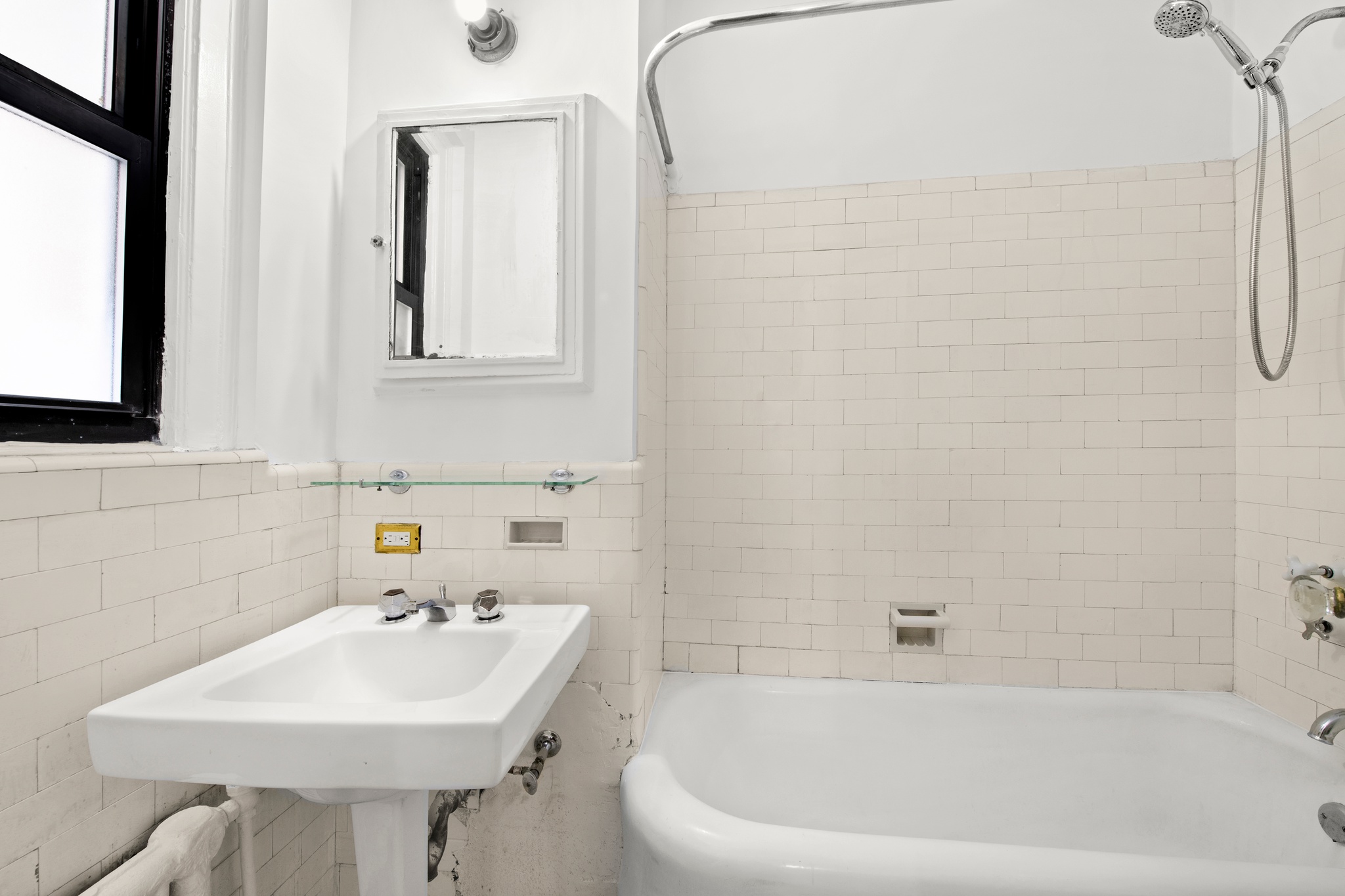 55 East 72nd Street, Unit 2NORTH Manhattan, NY 10021 - Photo 12 of 18 a bathroom with a sink a toilet and shower