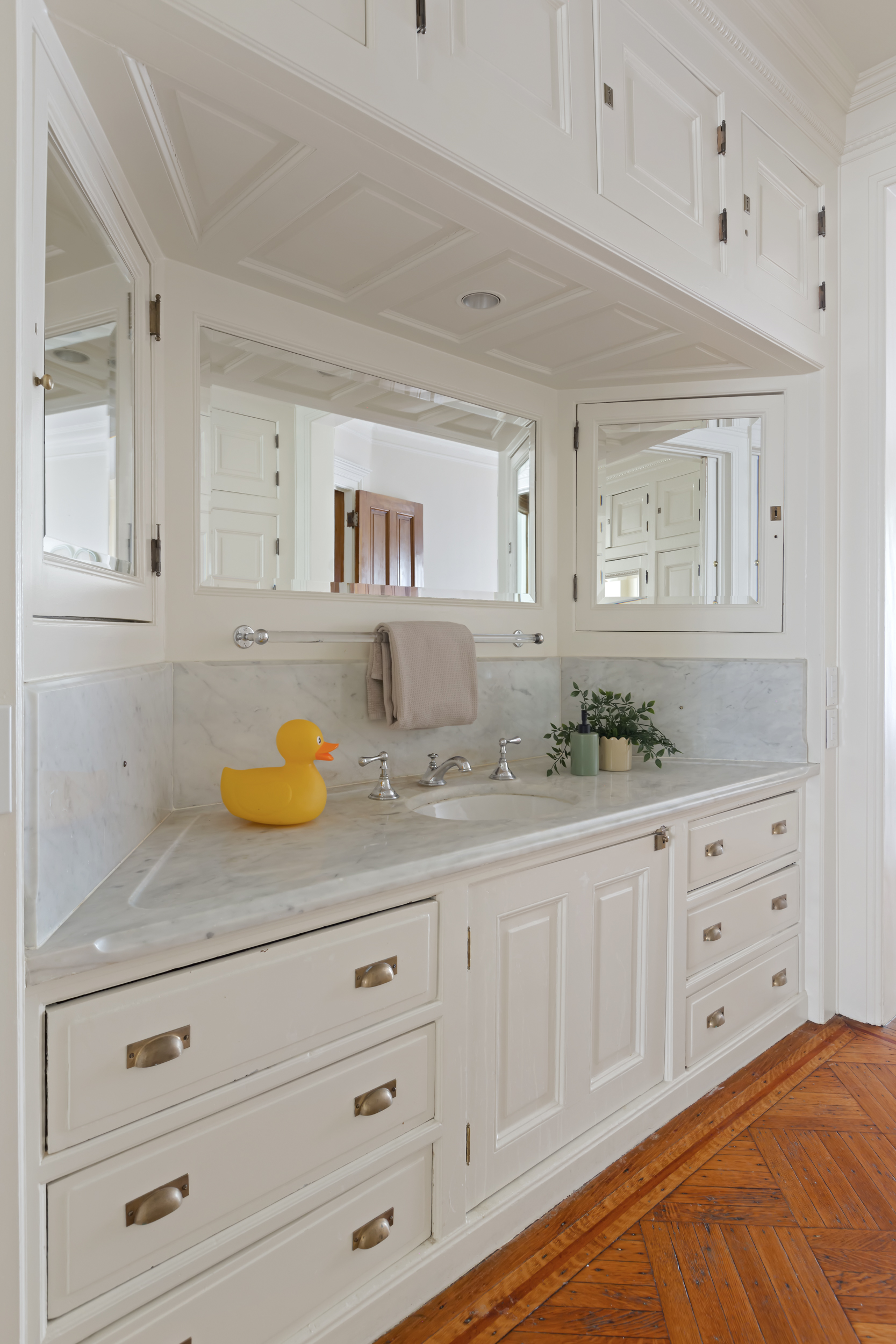 37 West 70th Street Manhattan, NY 10023 - Photo 28 of 41 a bathroom with a granite countertop double vanity sink and mirror