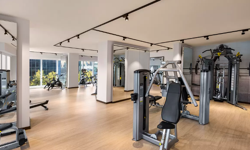 1 West End Avenue, Unit 16B Manhattan, NY 10023 - Photo 15 of 18 a view of a room with gym equipment