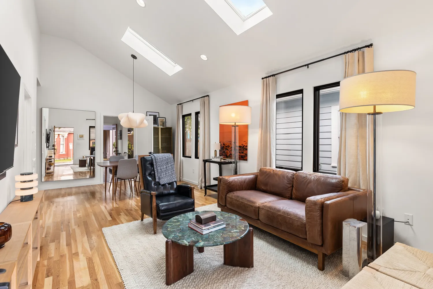 a living room with furniture and a table