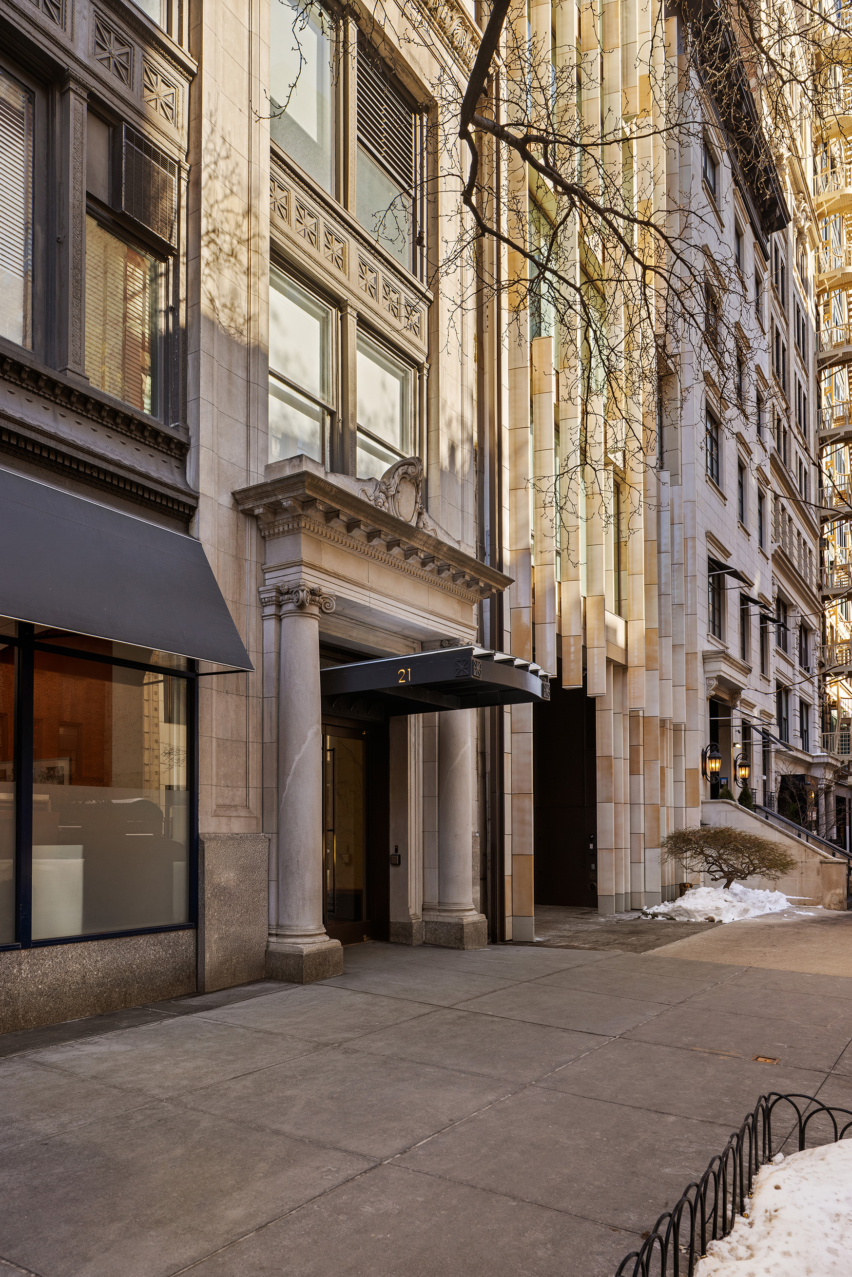 21 East 22nd Street, Unit 2K Manhattan, NY 10010 - Photo 10 of 13 a front view of a building with a street