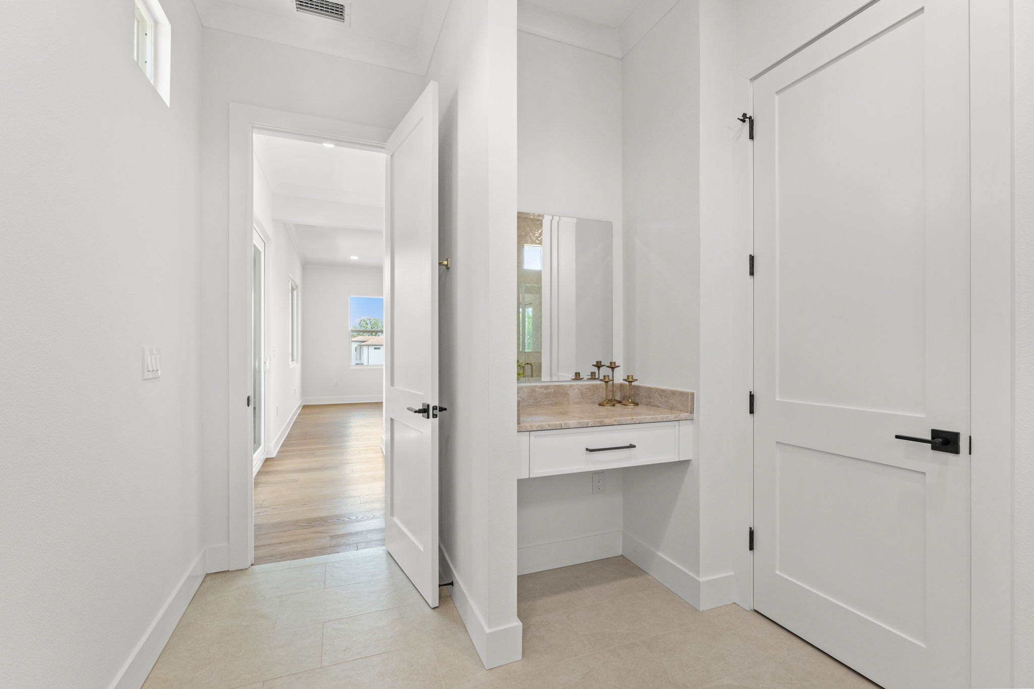 500 East Davis Boulevard Tampa, FL 33606 - Photo 20 of 36 a bathroom with a double vanity sink toilet and shower