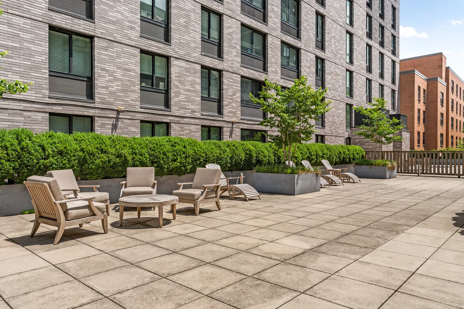 a view of a building with sitting area