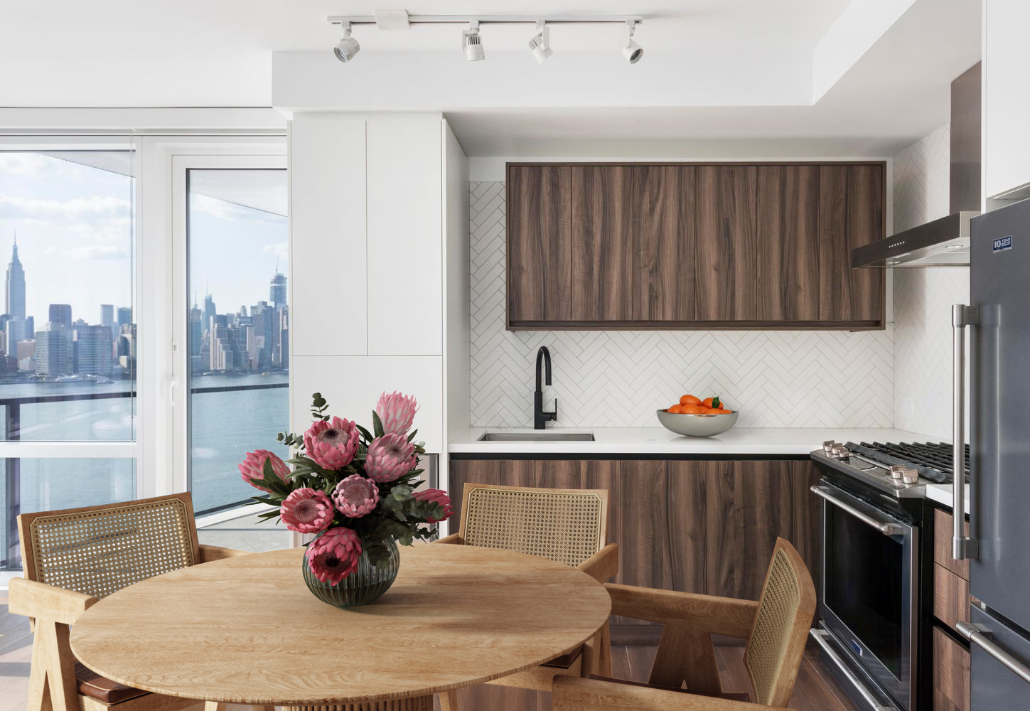 21 India Street, Unit 2101 Brooklyn, NY 11222 - Photo 3 of 22 a kitchen with a stove a sink and a potted plant