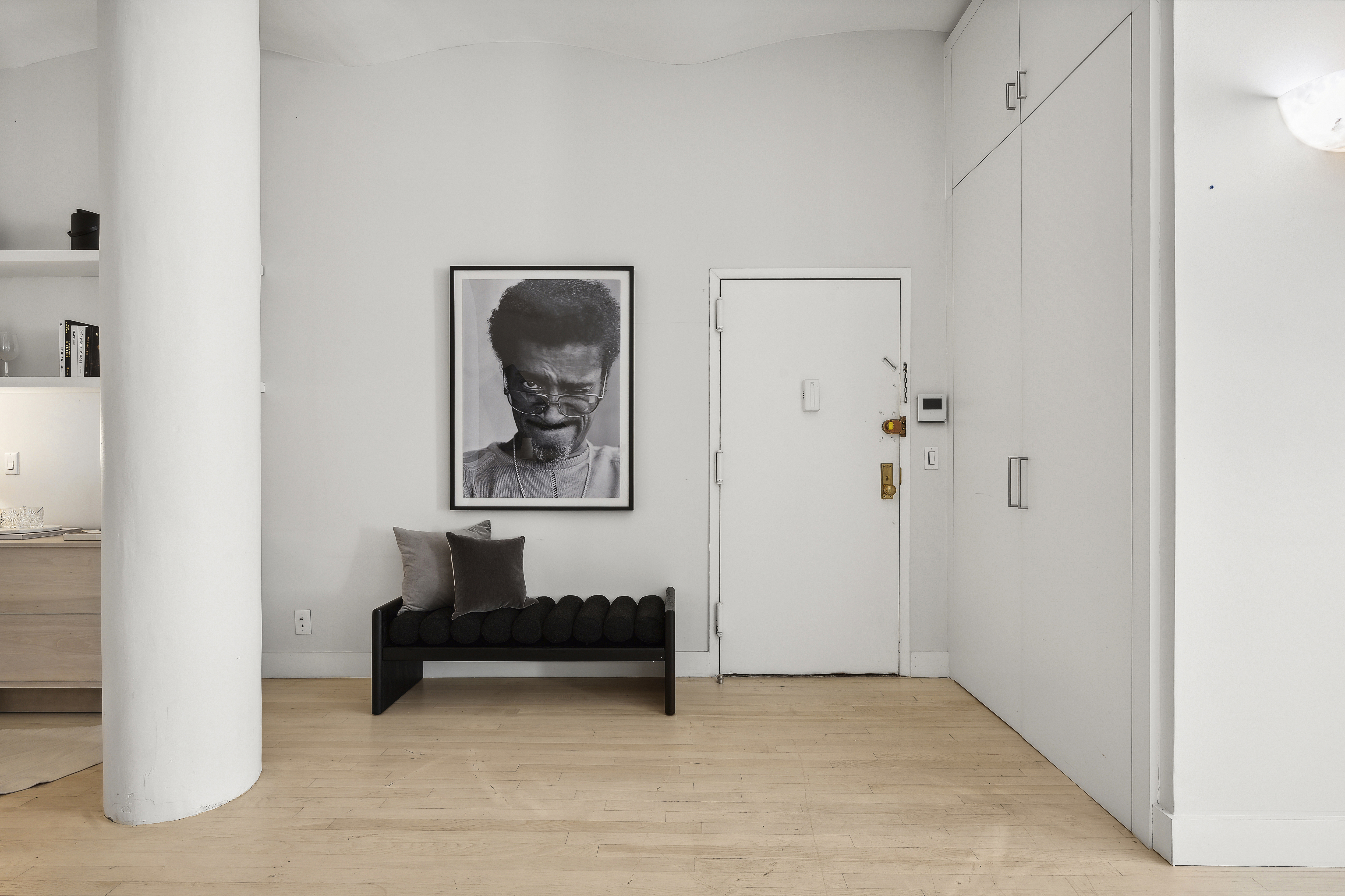 4 West 16th Street, Unit 4A Manhattan, NY 10011 - Photo 10 of 11 a view of a livingroom with wooden floor and a ceiling fan