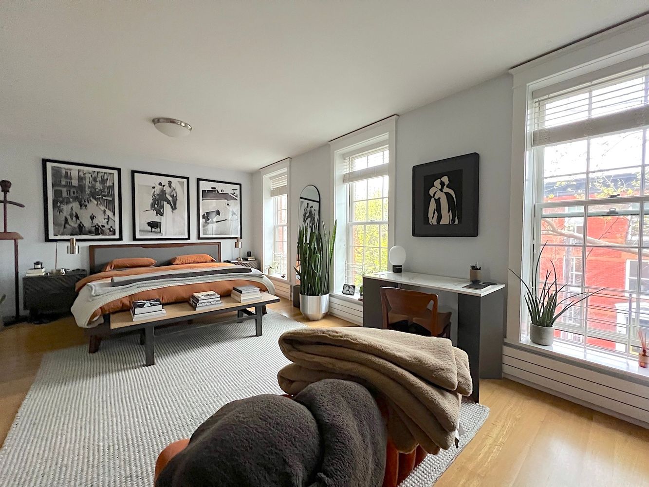 148 Luquer Street, Unit 2 Brooklyn, NY 11231 - Photo 9 of 22 a bedroom with a bed and glass window