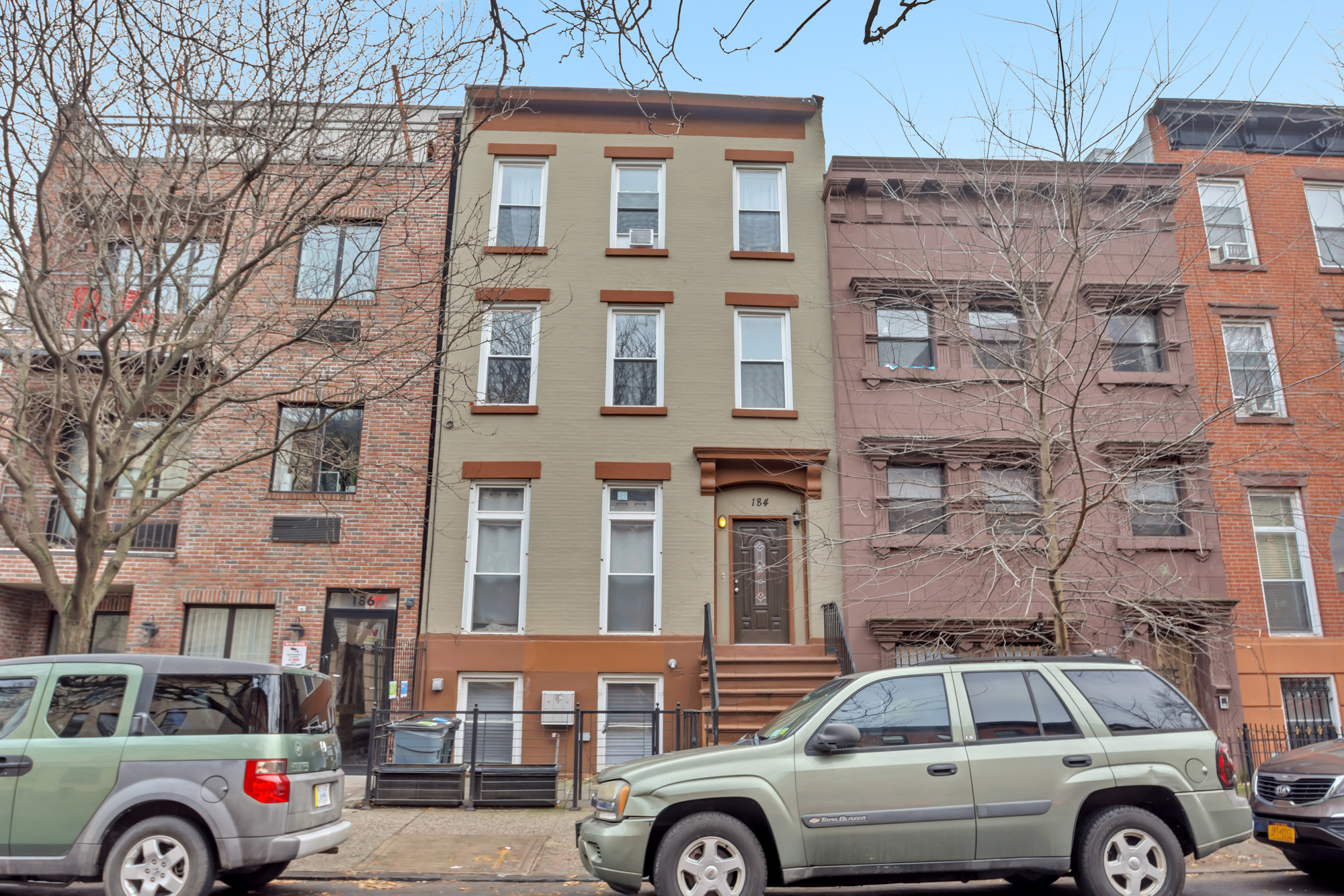 184 Herkimer Street, Unit 2 Brooklyn, NY 11216 - Photo 8 of 9 a front view of a building with parking space