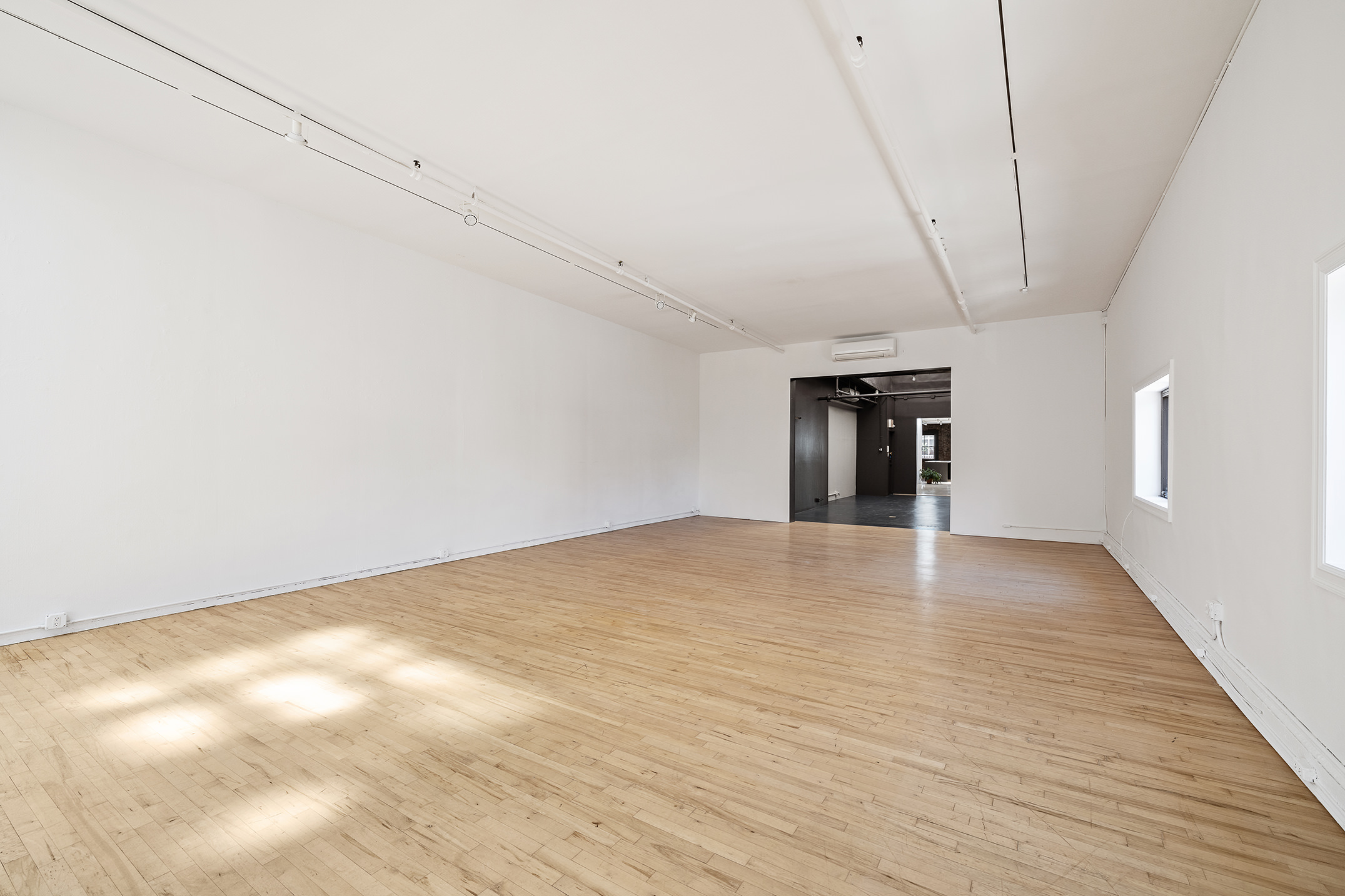 47 Howard Street, Unit 5 Manhattan, NY 10013 - Photo 6 of 9 a view of empty room with wooden floor