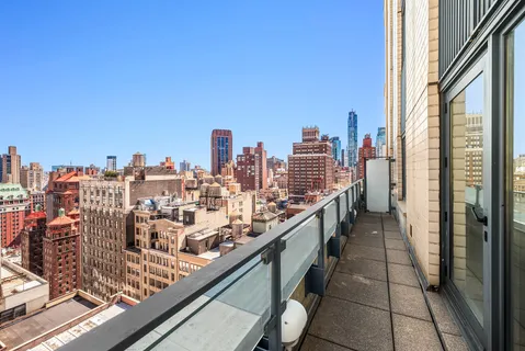 a view of a city with tall buildings