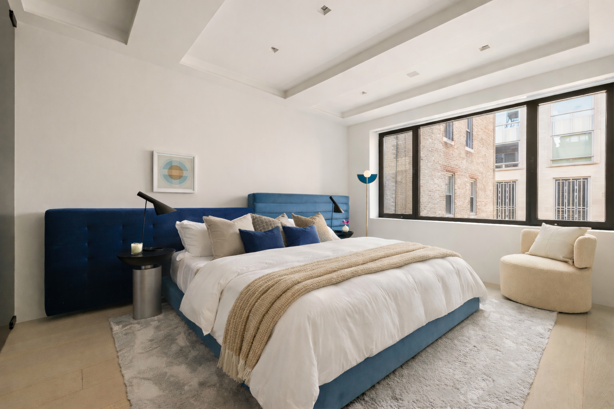 230 Central Park South Manhattan, NY 10019 - Photo 18 of 23 a bedroom with bed and large large window