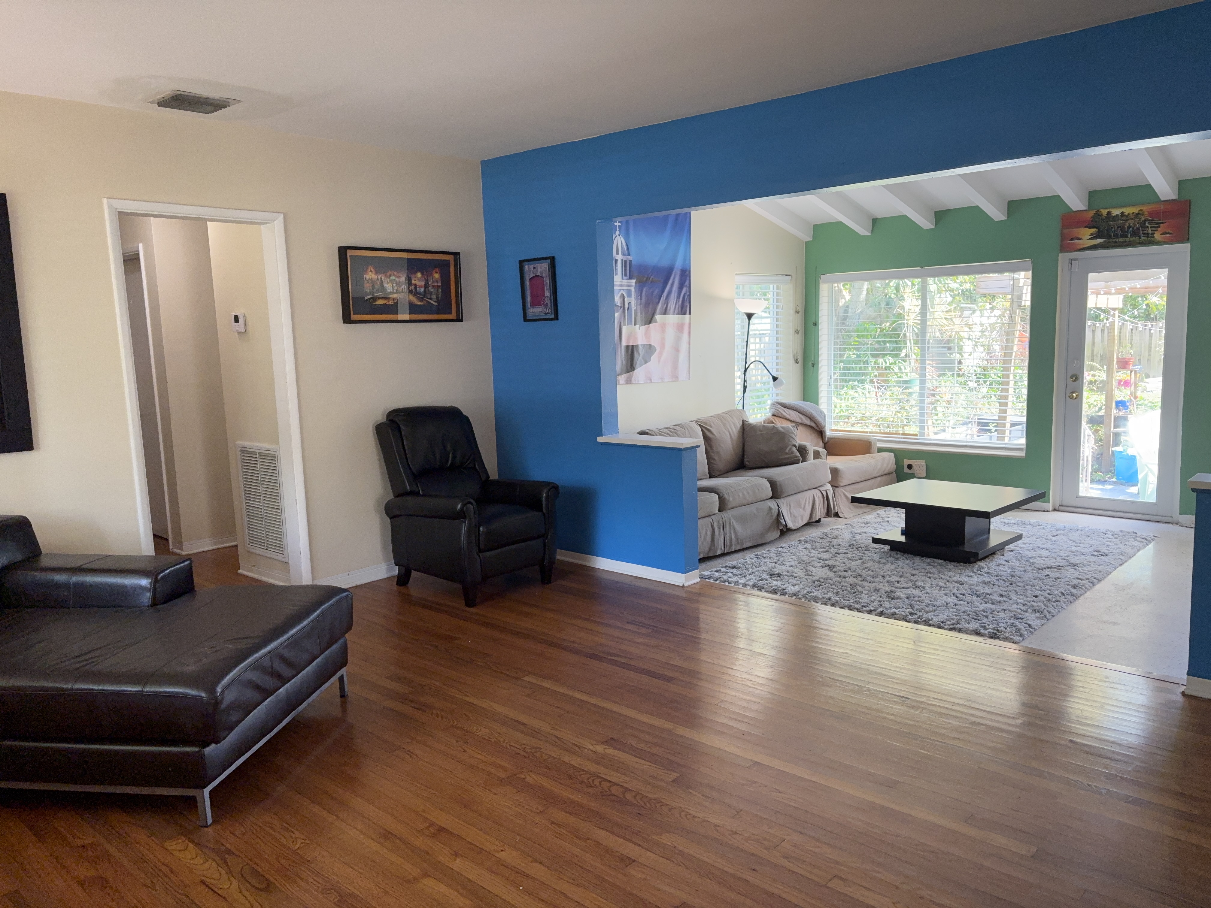 14 Northeast 108th Street Miami, FL 33161 - Photo 2 of 4 a living room with furniture and wooden floor