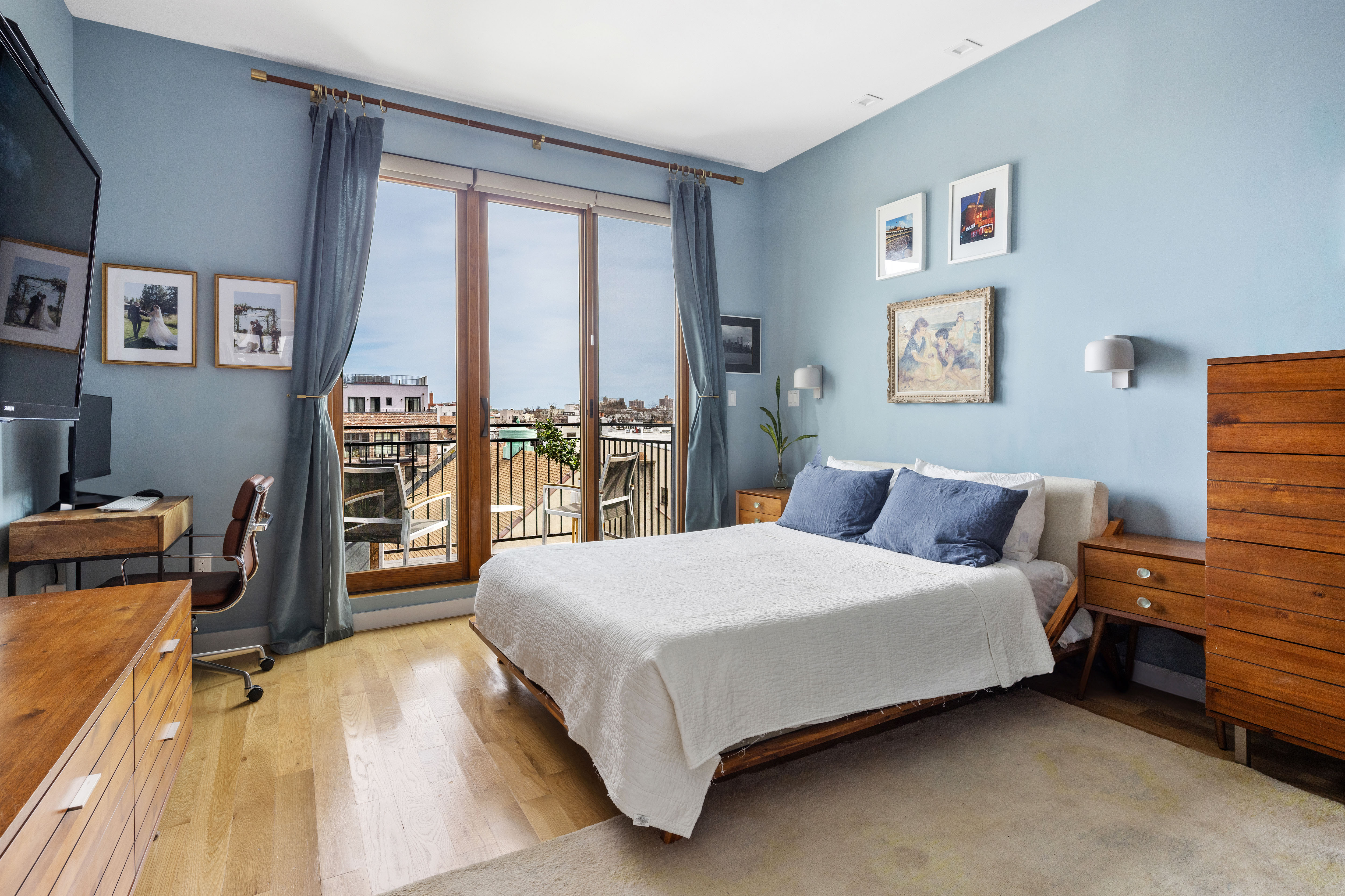 64 Stanhope Street, Unit PH Brooklyn, NY 11221 - Photo 6 of 13 a bedroom with a bed and a couch