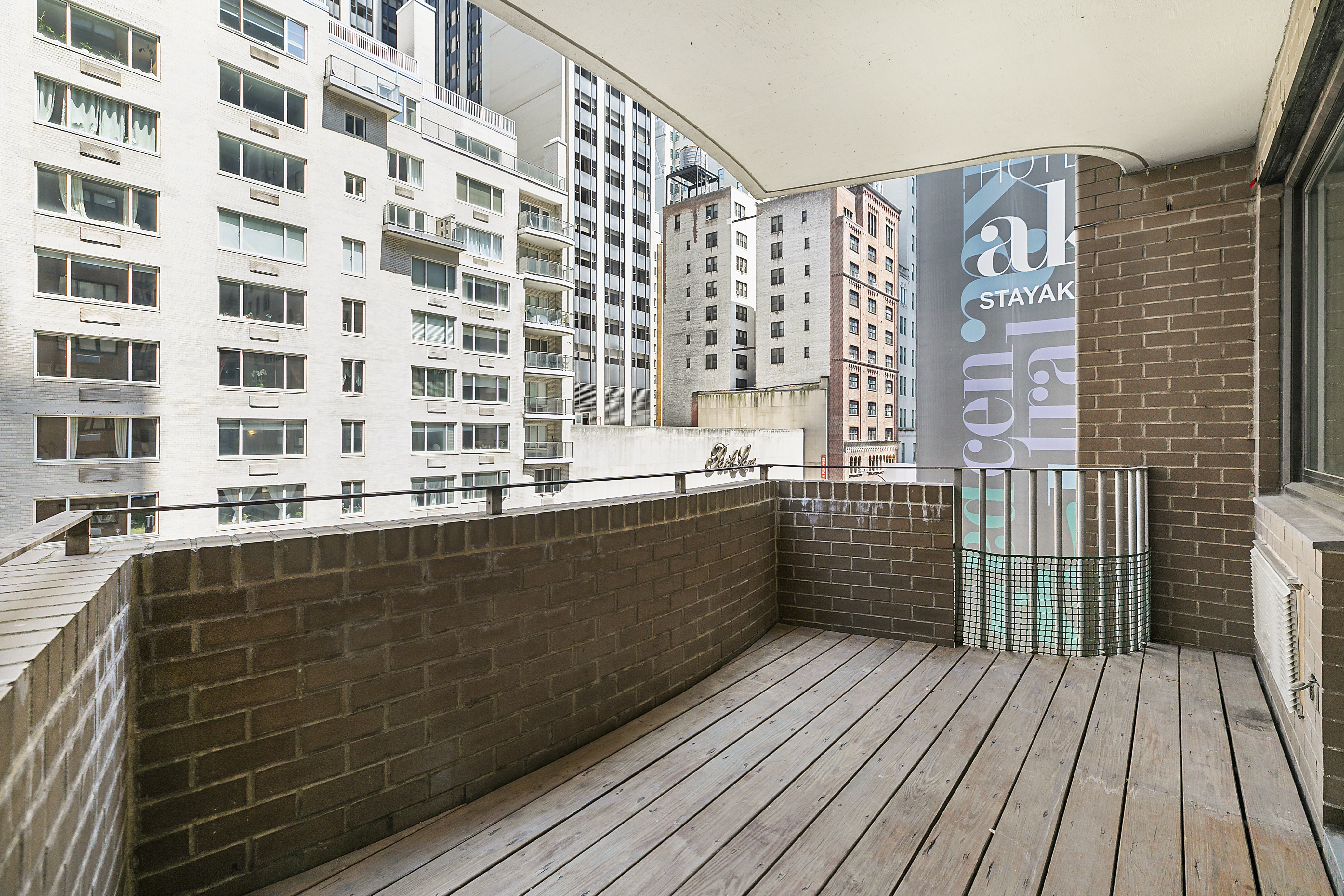 58 West 58th Street, Unit 4C Manhattan, NY 10019 - Photo 13 of 14 a bathroom with a bathtub and a sink