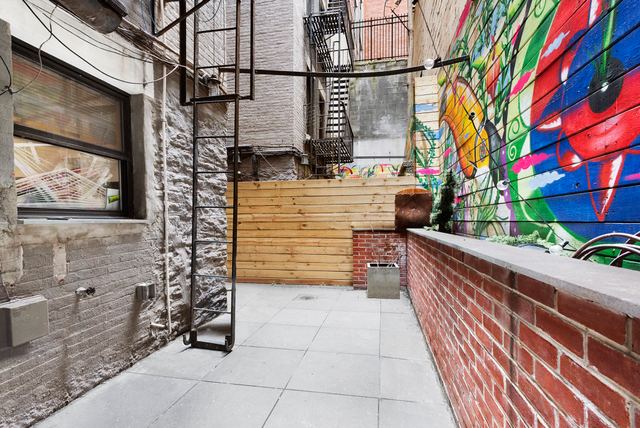 1773 1st Avenue, Unit 1 Manhattan, NY 10128 - Photo 2 of 8 a view of a pathway with a street view
