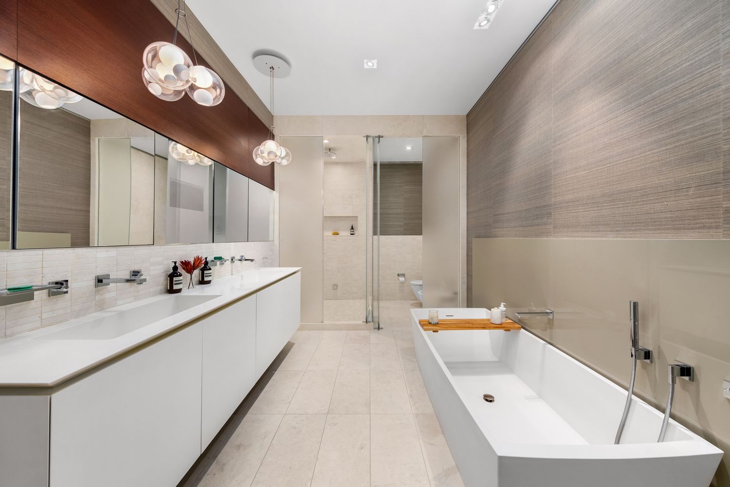 a bathroom with a bathtub and a sink