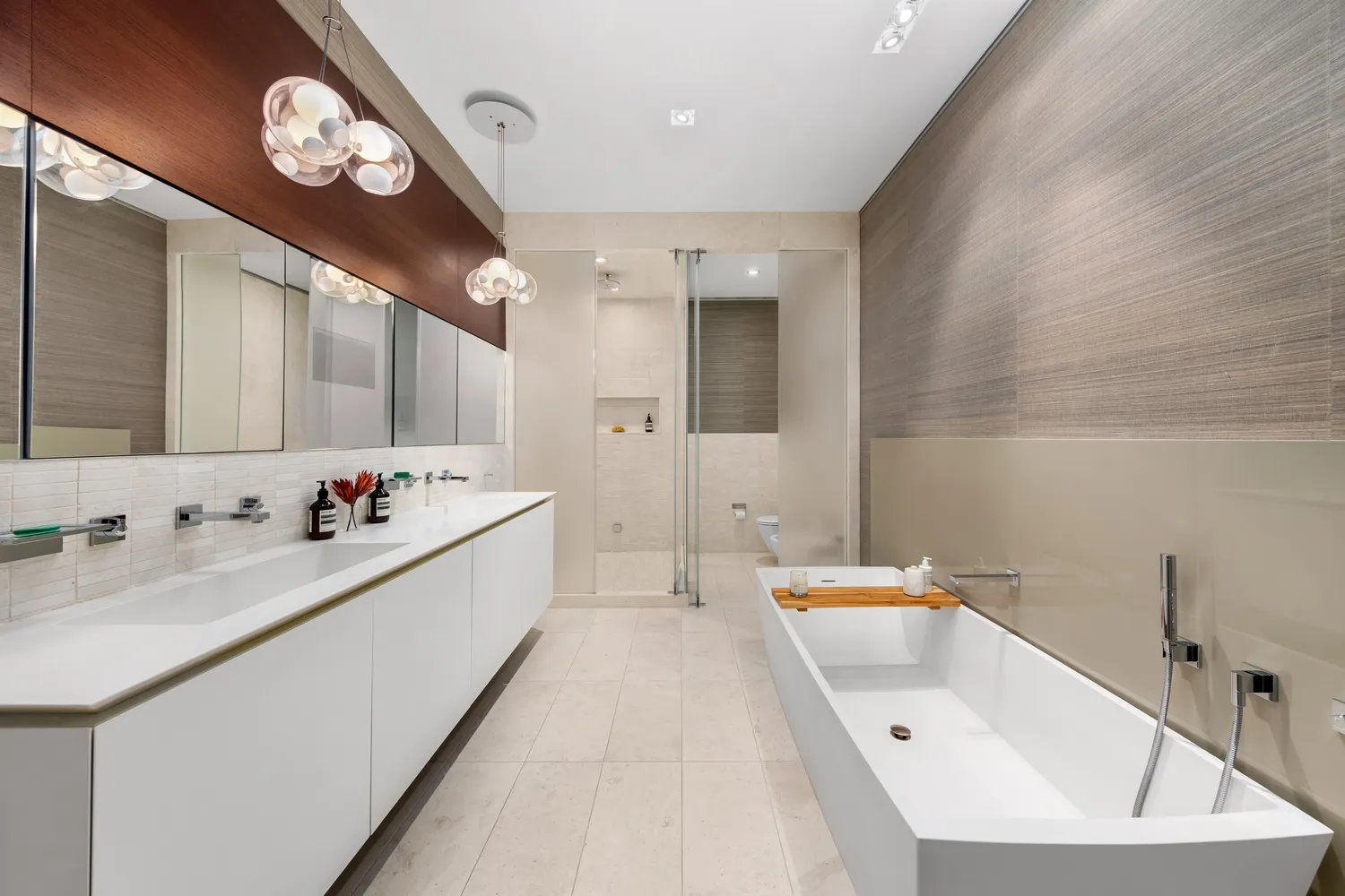 a bathroom with a bathtub and a sink