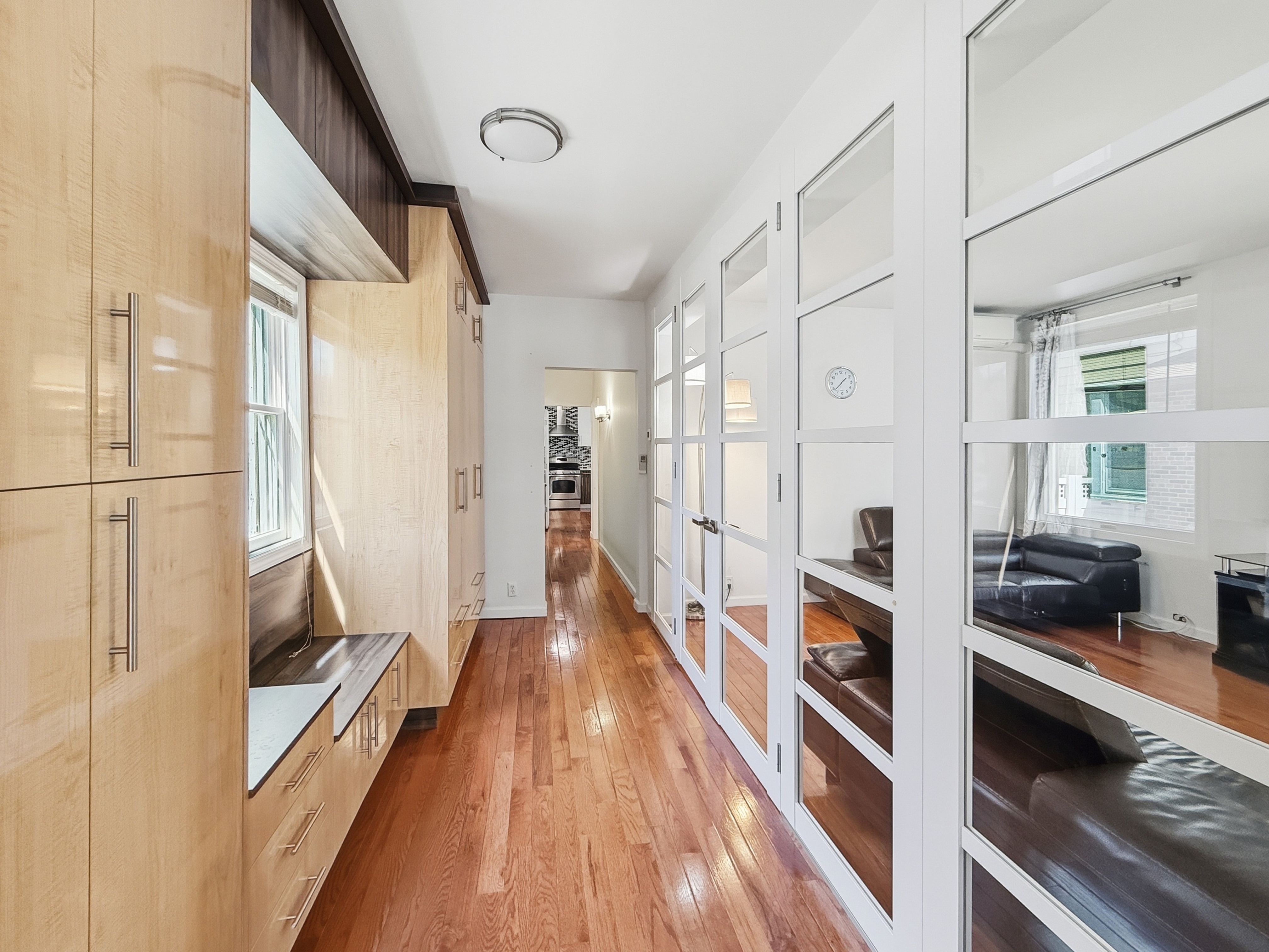 3735 Oceanic Avenue Brooklyn, NY 11224 - Photo 2 of 26 a view of a hallway with wooden floor and staircase