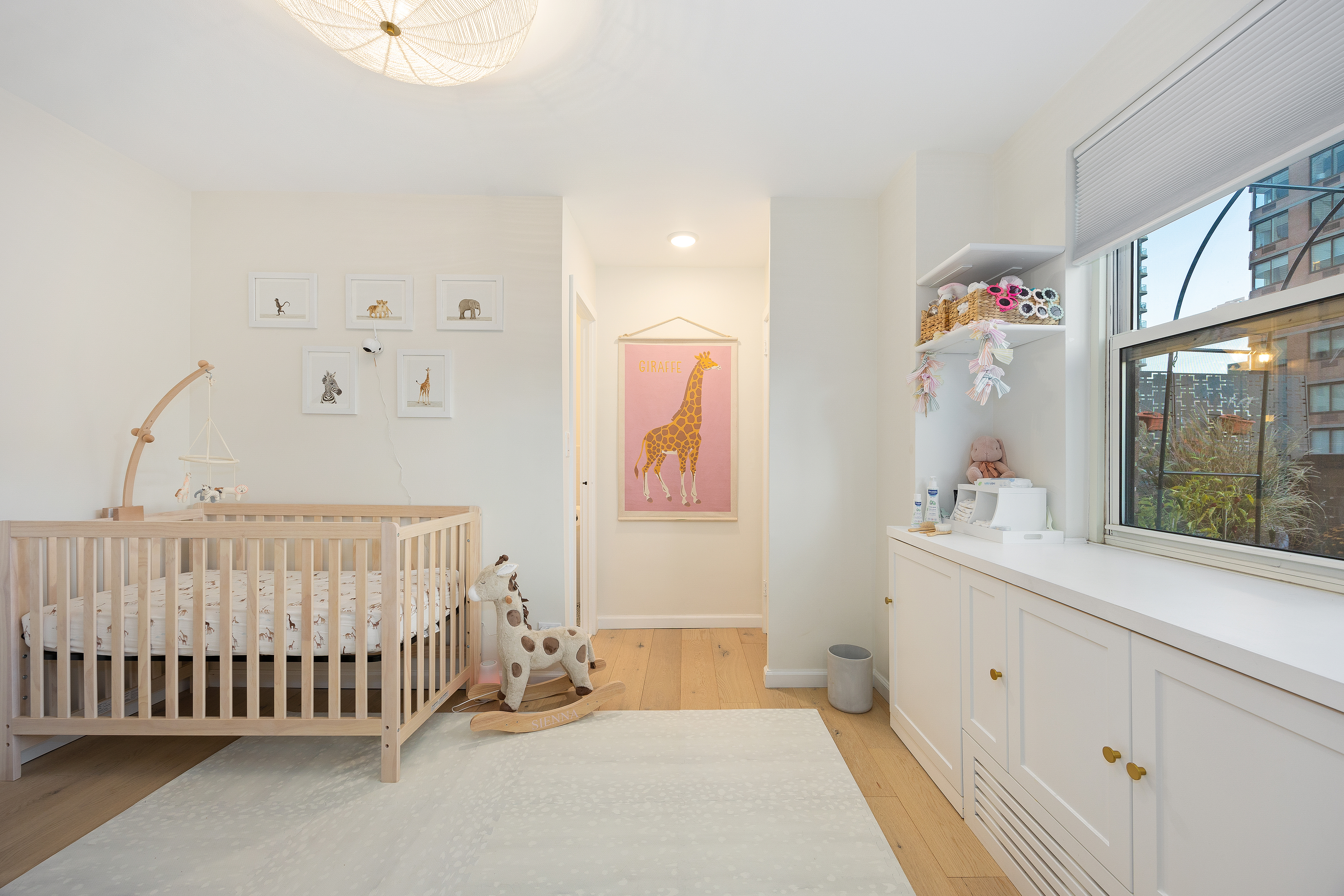 333 East 79th Street, Unit 18N Manhattan, NY 10075 - Photo 8 of 11 a spacious bedroom with a bed and window