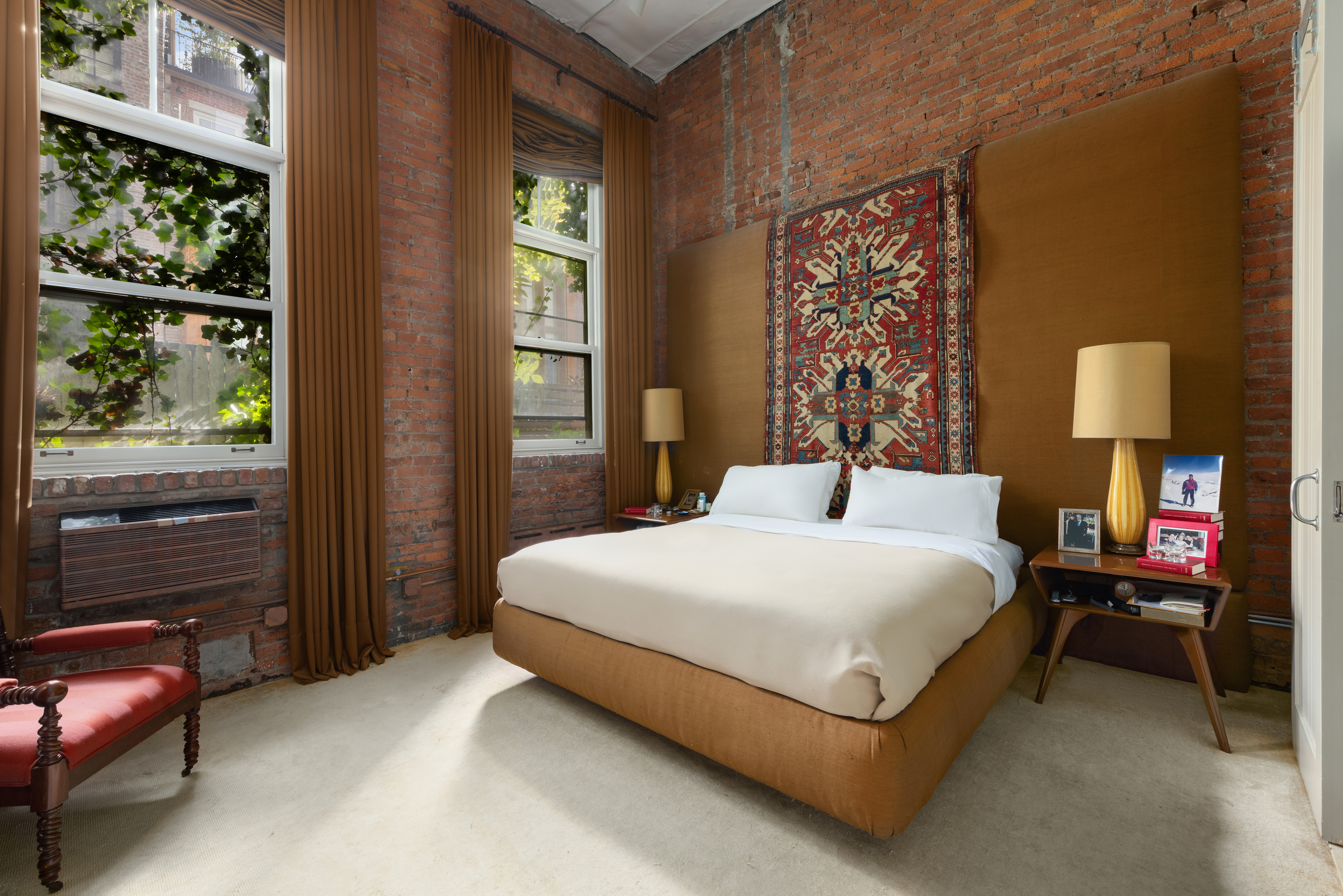 72 Horatio Street, Unit 1S Manhattan, NY 10014 - Photo 8 of 15 a bedroom with a bed and a night stand