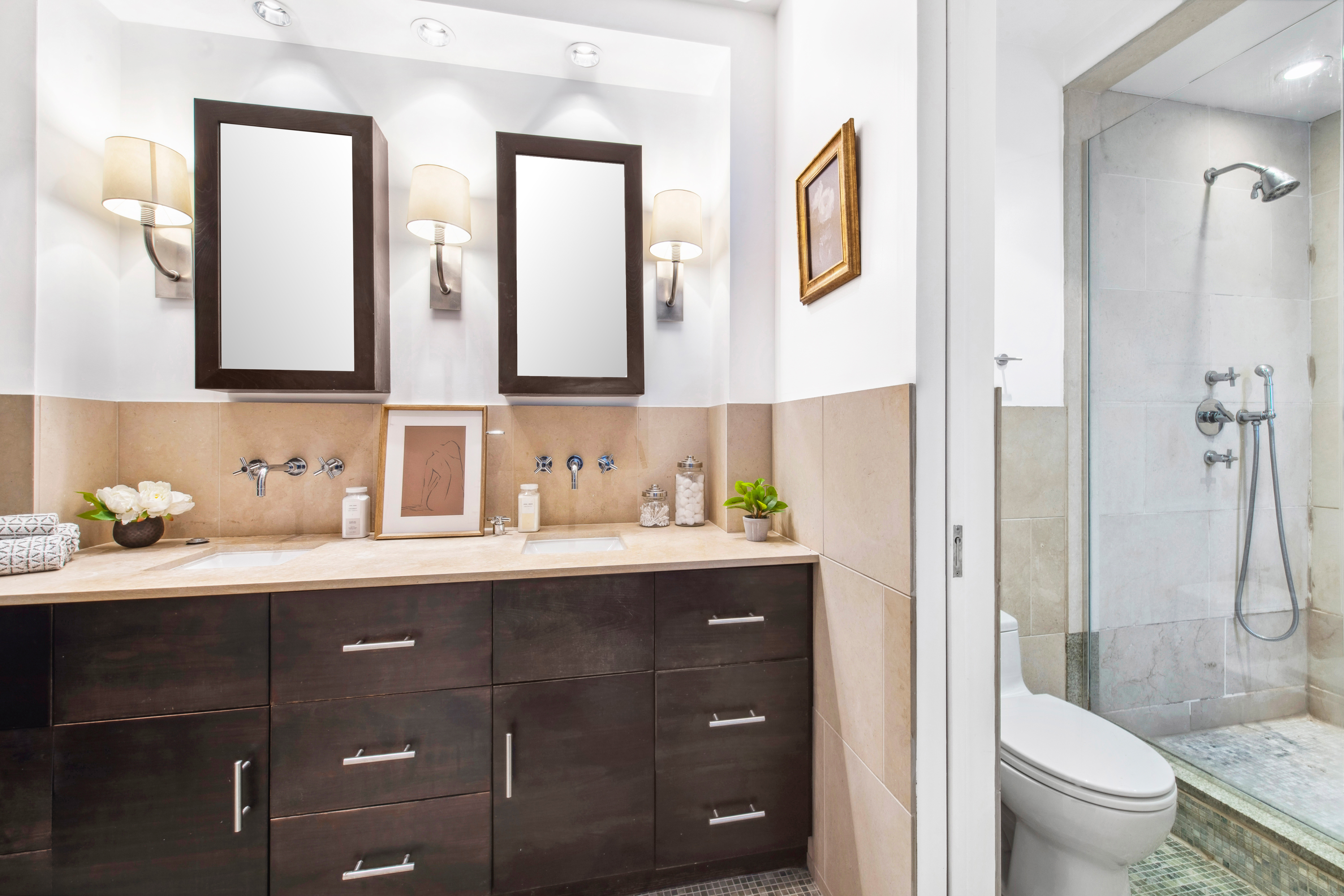 330 East 70th Street, Unit 5AB Manhattan, NY 10021 - Photo 8 of 13 a bathroom with a granite countertop sink mirror and toilet