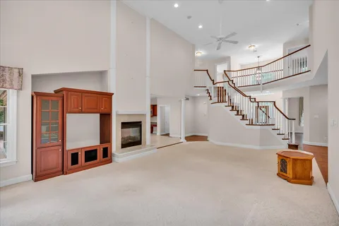 a kitchen with stainless steel appliances granite countertop a sink and a stove