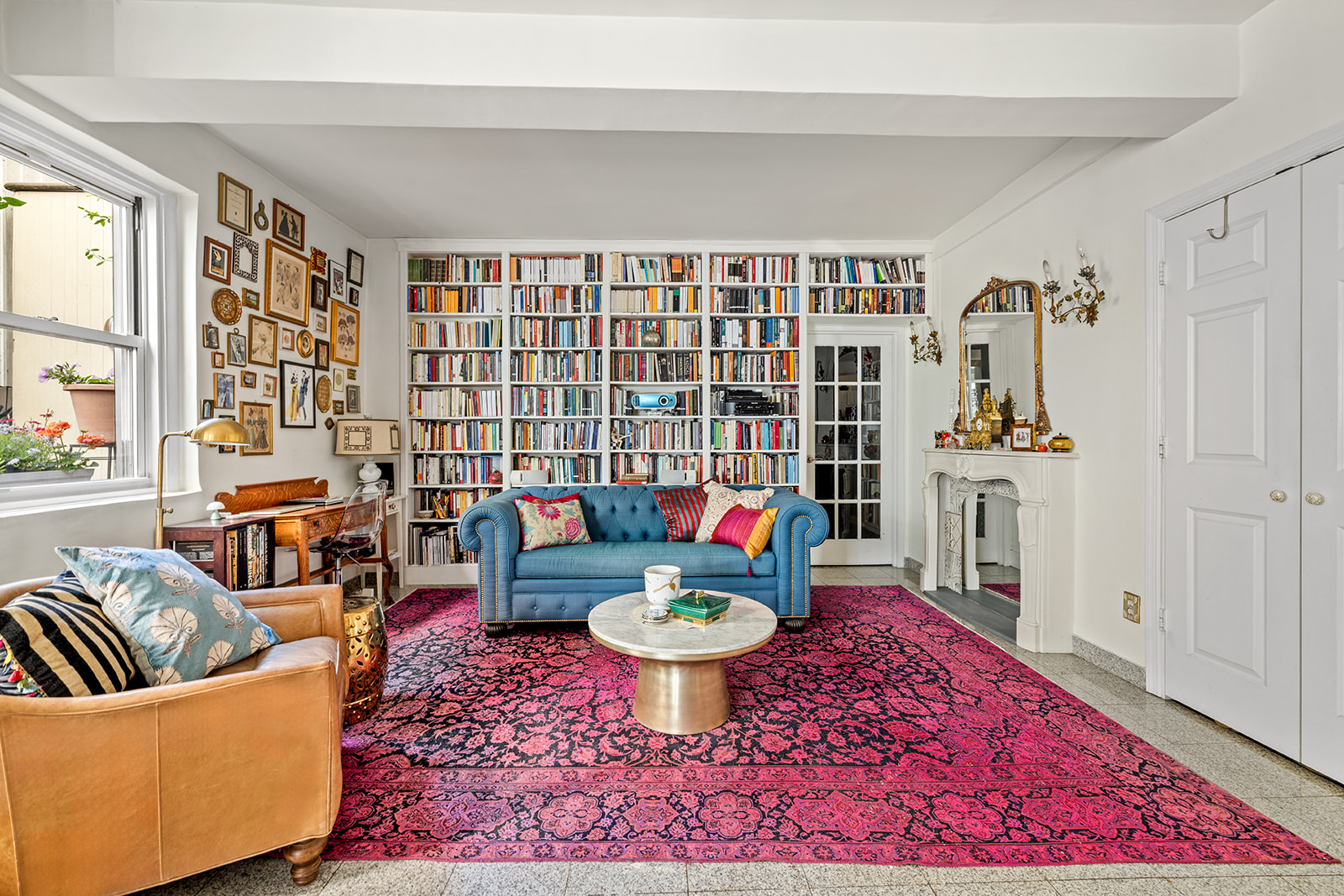 2166 Broadway, Unit 4C Manhattan, NY 10024 - Photo 2 of 10 a living room with furniture a rug and a chandelier