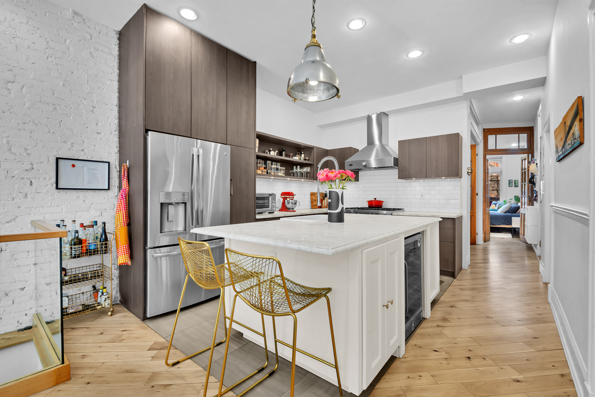 361 6th Avenue, Unit 1 Brooklyn, NY 11215 - Photo 3 of 11 a kitchen that has a lot of cabinets and refrigerator in it