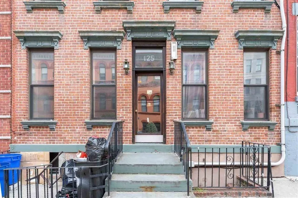 a front view of a house with a porch