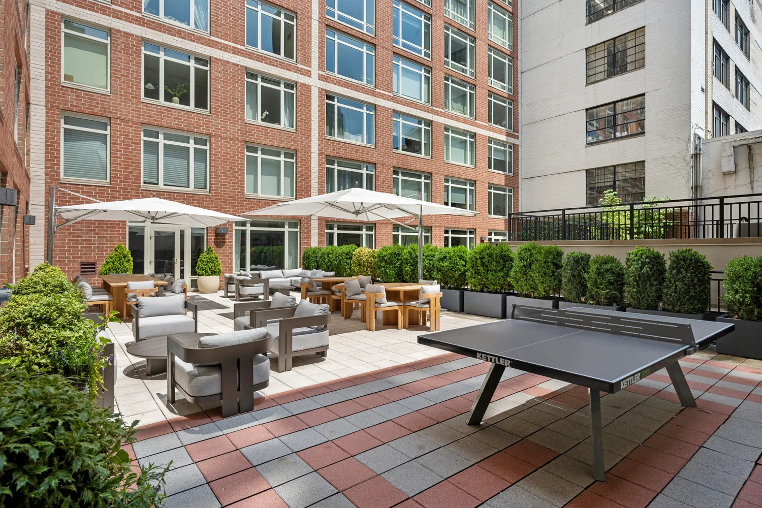 a view of a building and outdoor seating