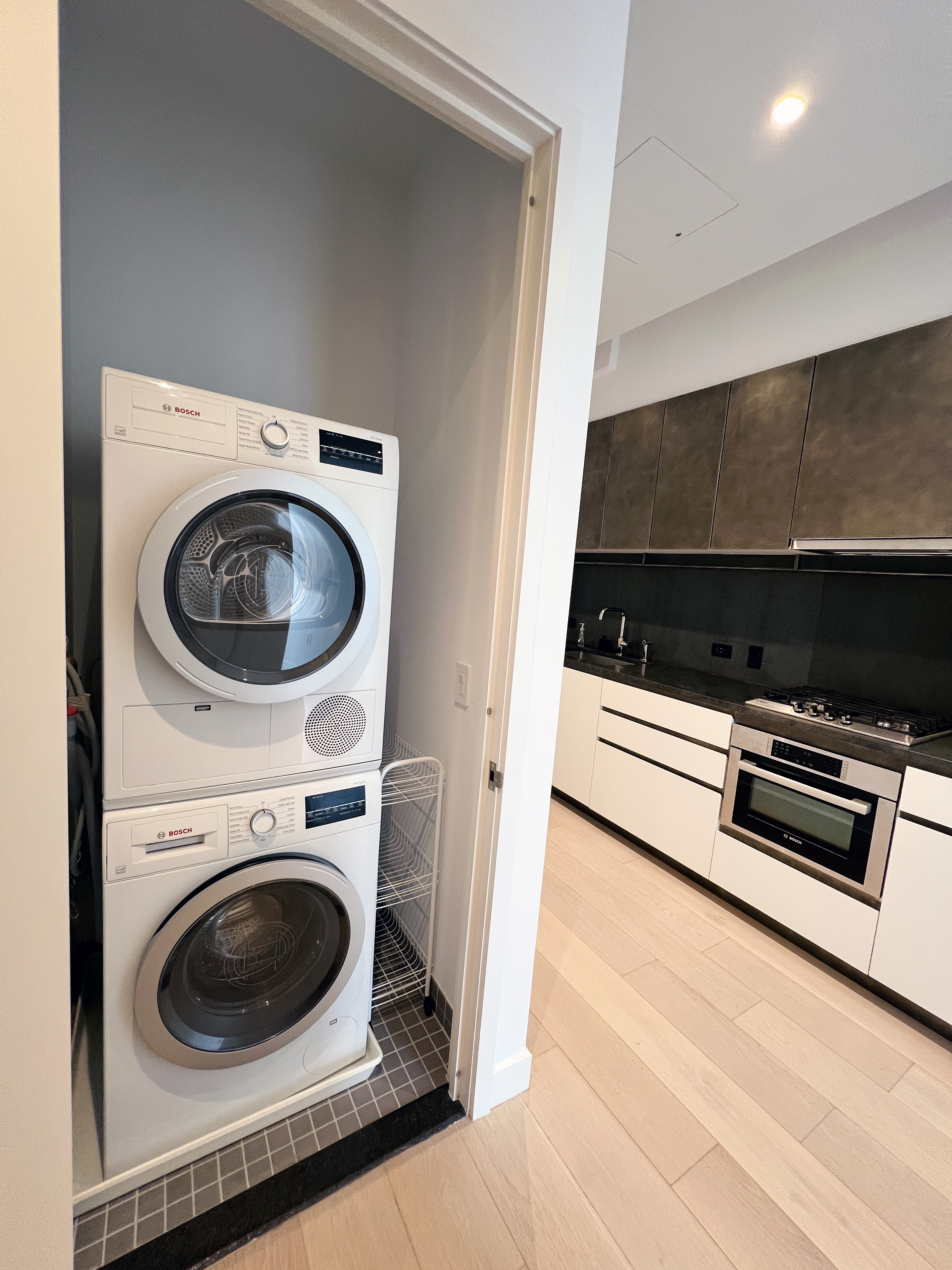11 Hoyt Street, Unit 10M Brooklyn, NY 11201 - Photo 10 of 24 a utility room with dryer and washer