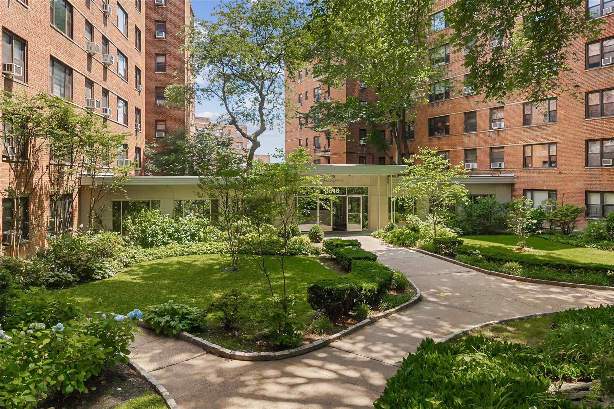 3616 Henry Hudson Parkway, Unit 7GN Bronx, NY 10463 - Photo 16 of 17 a view of a garden with a fountain