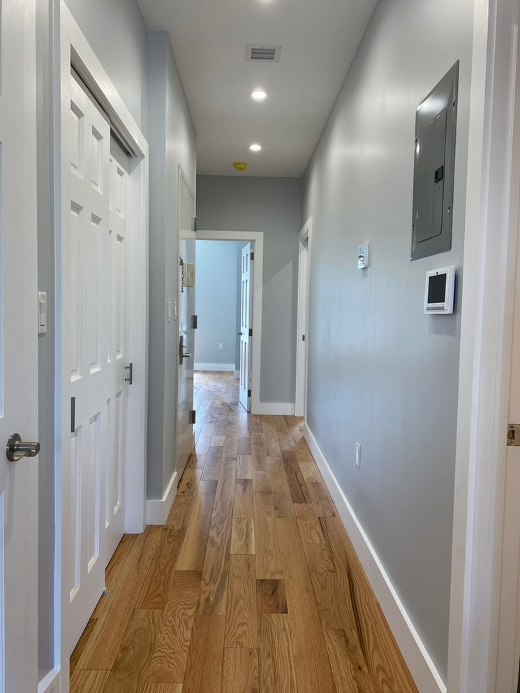 465 6th Avenue, Unit 2 Brooklyn, NY 11215 - Photo 3 of 10 a view of hallway with wooden floor