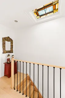 a hallway with a staircase