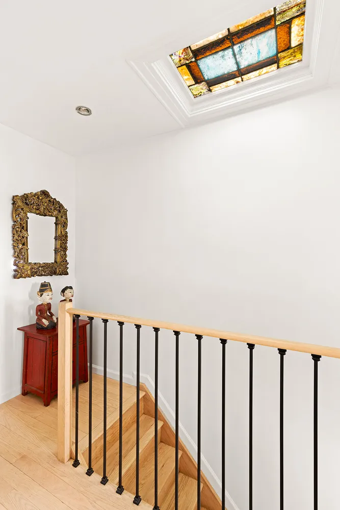 a hallway with a staircase